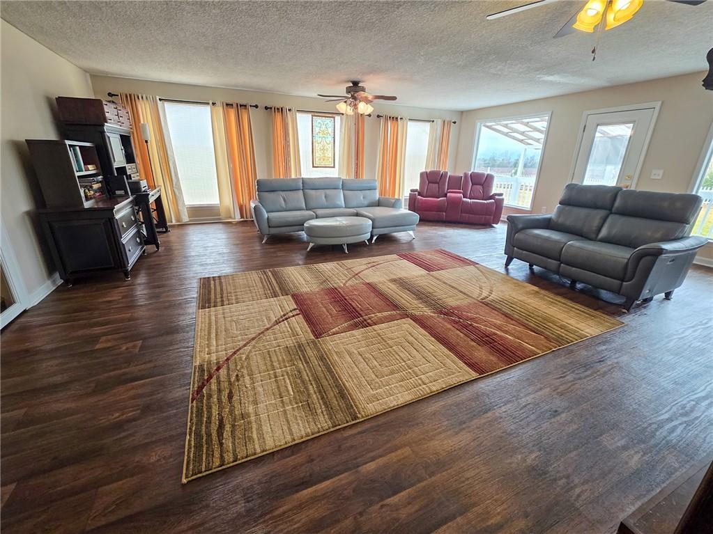 589 Jacksonville Scotland Road Jacksonville, GA 31544 - Photo 49 of 87 a living room with furniture and a flat screen tv