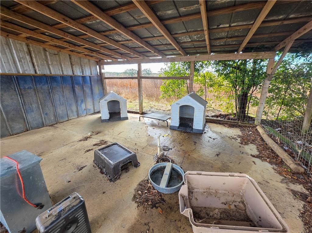 589 Jacksonville Scotland Road Jacksonville, GA 31544 - Photo 72 of 87 a backyard of a house with fountain fire pit and outdoor seating