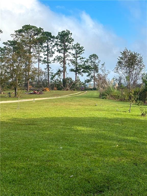 589 Jacksonville Scotland Road Jacksonville, GA 31544 - Photo 74 of 87 a view of an ocean with a building in the background