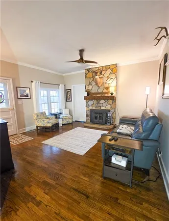 a kitchen with stainless steel appliances granite countertop a stove a sink dishwasher and a refrigerator