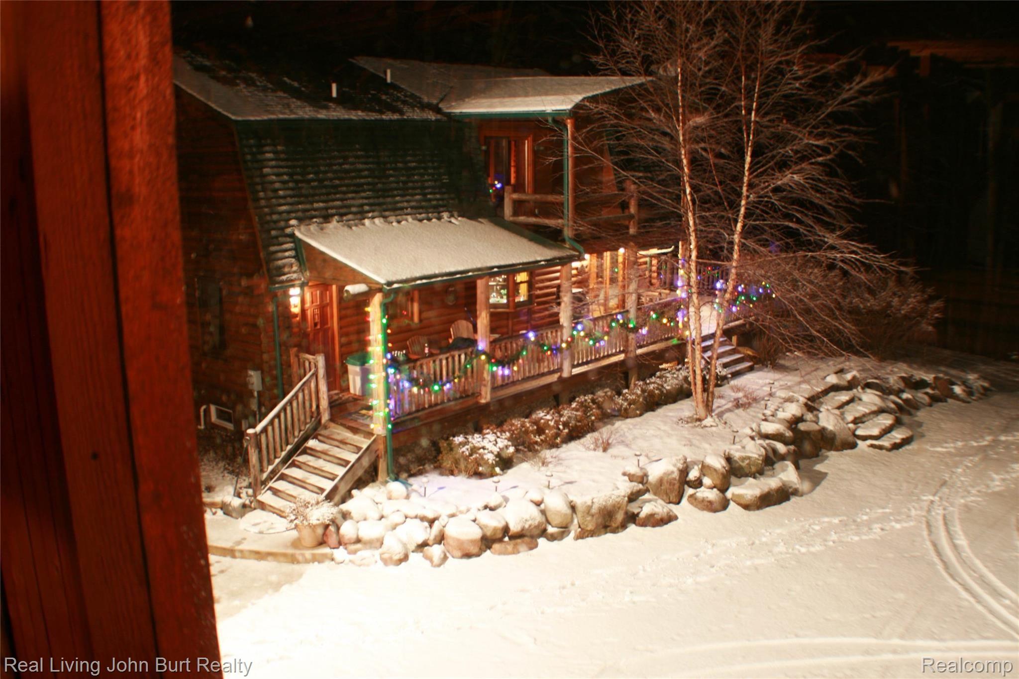 1605 Shoup Road Leonard, MI 48367 - Photo 35 of 37 Nighttime view of east side of home at Christmas, lovely!