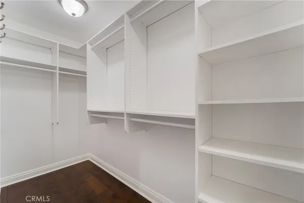 a view of an empty walk in closet