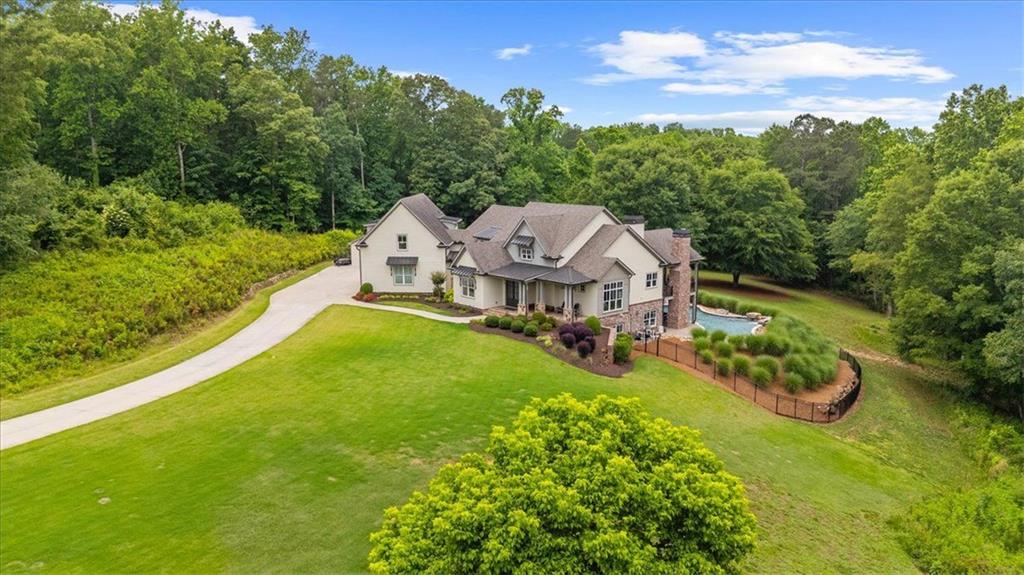 2503 Sugar Pike Road Canton, GA 30115 - Photo 29 of 134 an aerial view of a house with swimming pool garden and mountain view in back