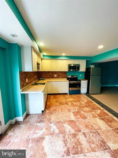 2995 Windy Bush Road New Hope, PA 18938 - Photo 31 of 36 Vibrant kitchen with modern finishes.