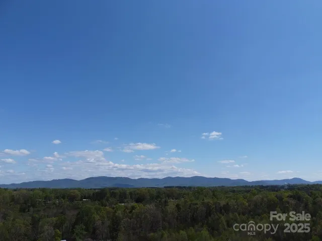 a view of mountain and sunset
