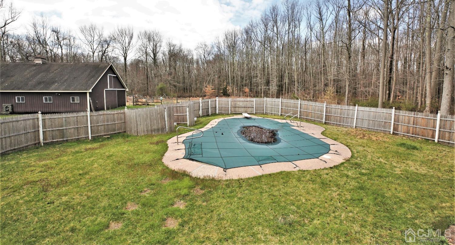 55 Friendship Road Cranbury, NJ 08512 - Photo 63 of 71 a view of a backyard with swimming pool