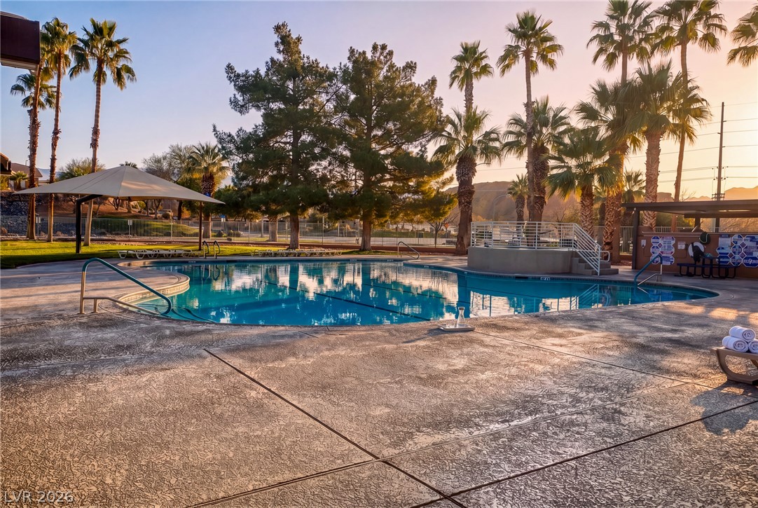 1460 Blue Ridge Trail Mesquite, NV 89027 - Photo 38 of 39 An inviting community pool with tropical surroundings awaits, perfect for leisurely afternoons.