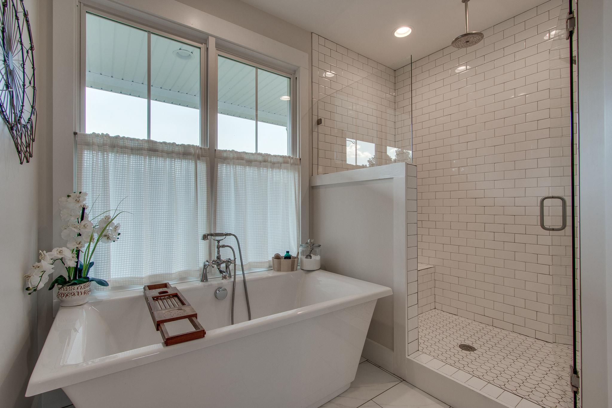 548 Hillview Road North Dickson, TN 37055 - Photo 14 of 30 Cast all your worries away as you step into your spa retreat bathroom, with a deep soaking tub and a large tile shower with dual shower heads.
