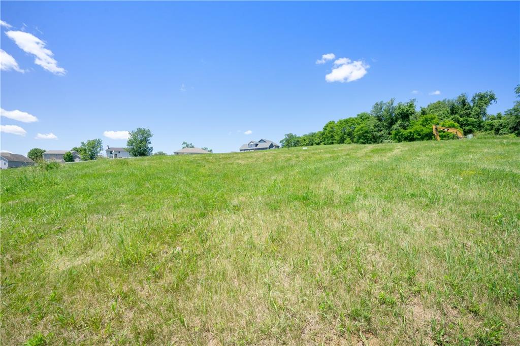 Lot # Coblestone Drive Burgettstown, PA 15021 - Photo 12 of 20 a view of a field with a tree in the background