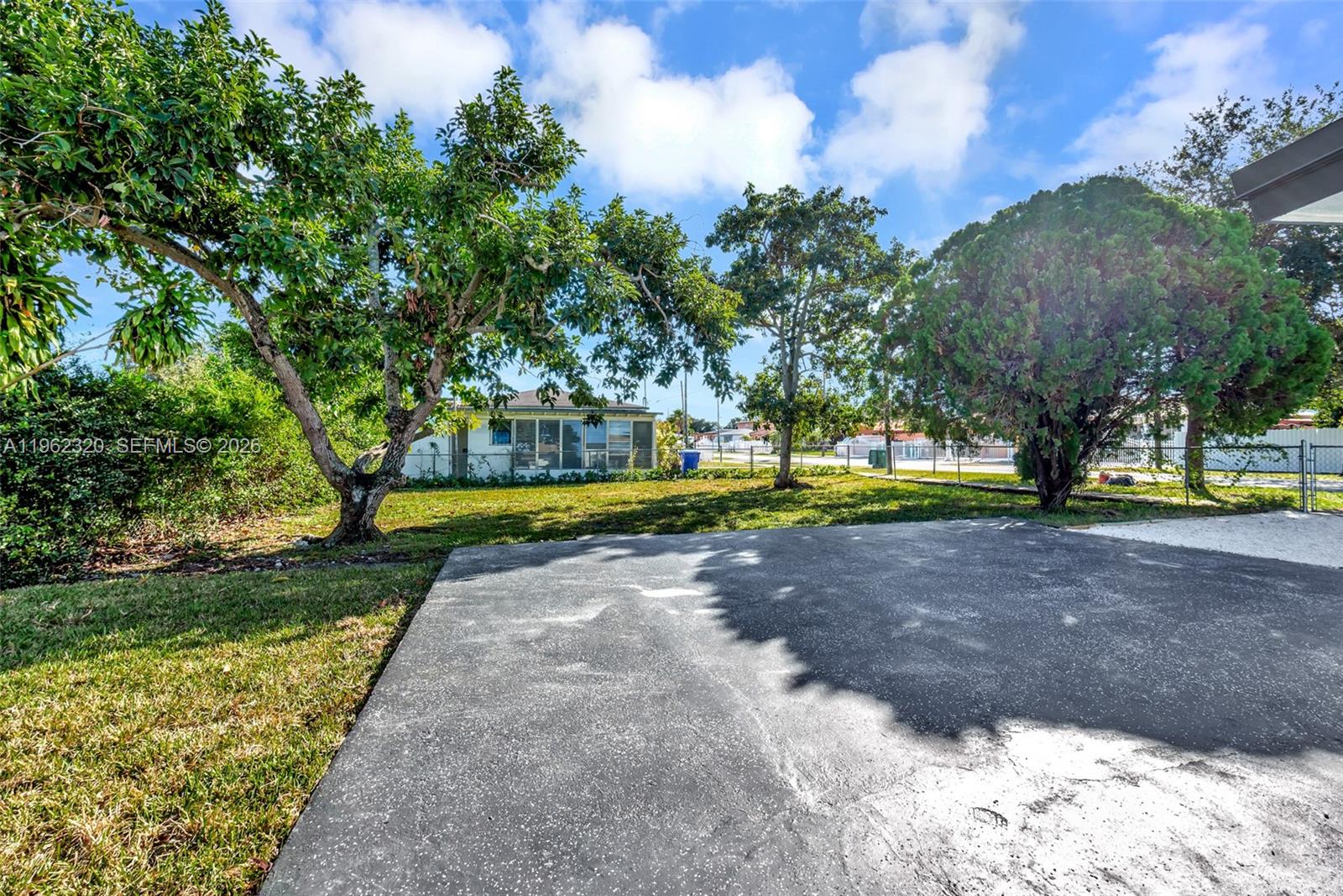 6540 Southwest 4th Street, Unit 6540 Miami, FL 33144 - Photo 29 of 42 a view of a park with large trees
