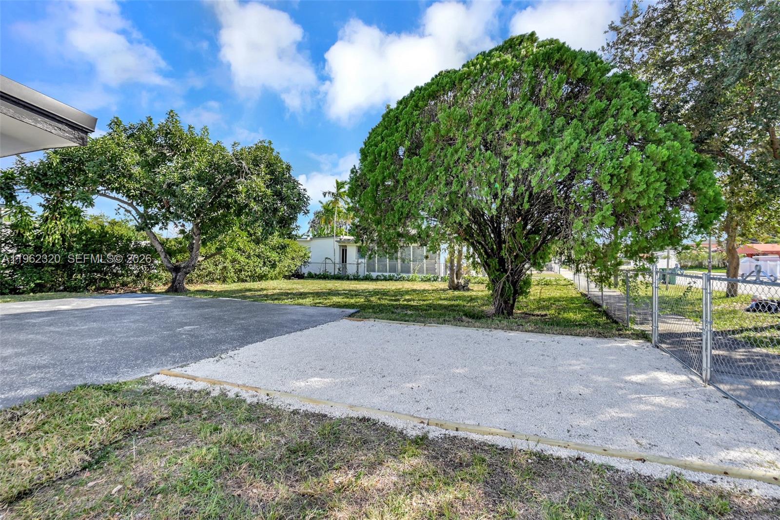 6540 Southwest 4th Street, Unit 6540 Miami, FL 33144 - Photo 33 of 42 a view of a yard with plants and trees