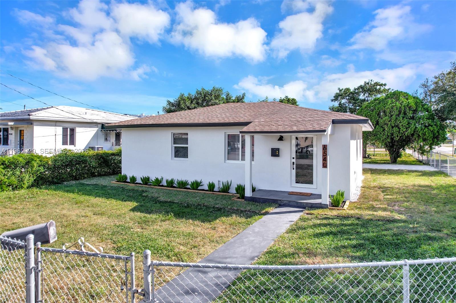 6540 Southwest 4th Street, Unit 6540 Miami, FL 33144 - Photo 34 of 42 a view of a house with backyard and garden