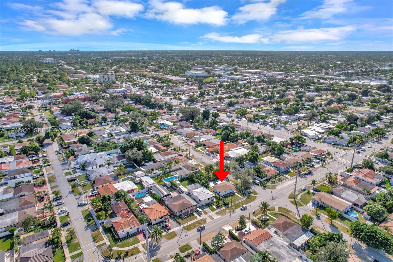 6540 Southwest 4th Street, Unit 6540 Miami, FL 33144 - Photo 39 of 42 an aerial view of residential houses with city and outdoor space