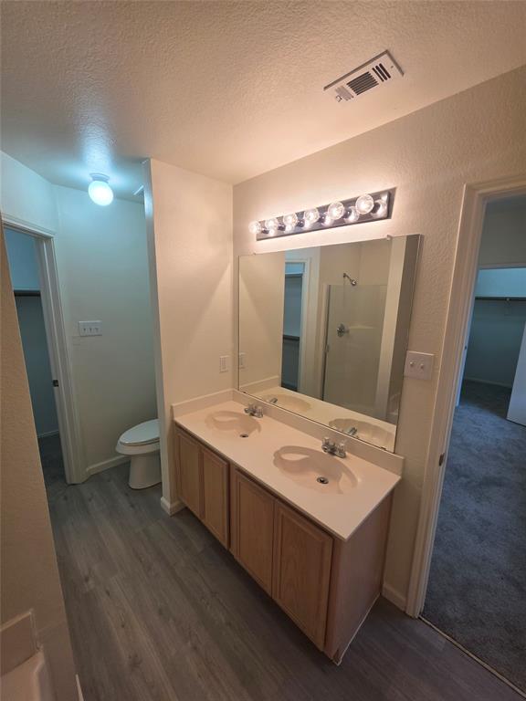1750 Oneal Street Lancaster, TX 75134 - Photo 9 of 14 a bathroom with a sink mirror and toilet