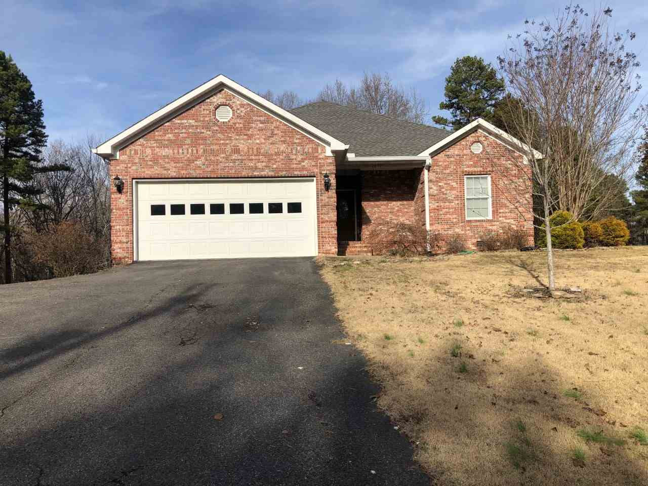 1070 Pleasant Springs Road Henderson, TN 38340 - Photo 1 of 1 a view of house with yard and trees in the background