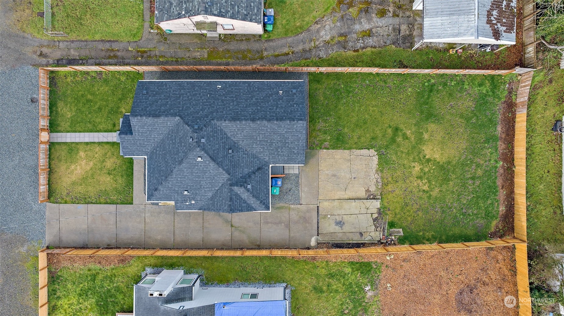 9848 18th Avenue Southwest Seattle, WA 98106 - Photo 29 of 32 an aerial view of a house with a yard