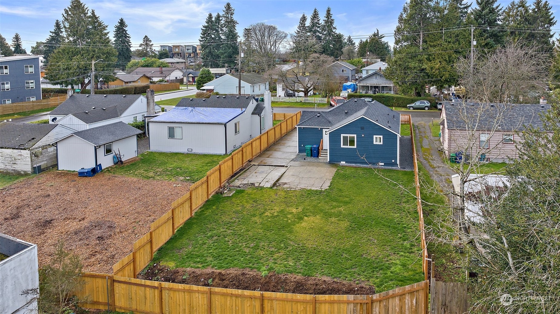 9848 18th Avenue Southwest Seattle, WA 98106 - Photo 30 of 32 a aerial view of a house with a garden