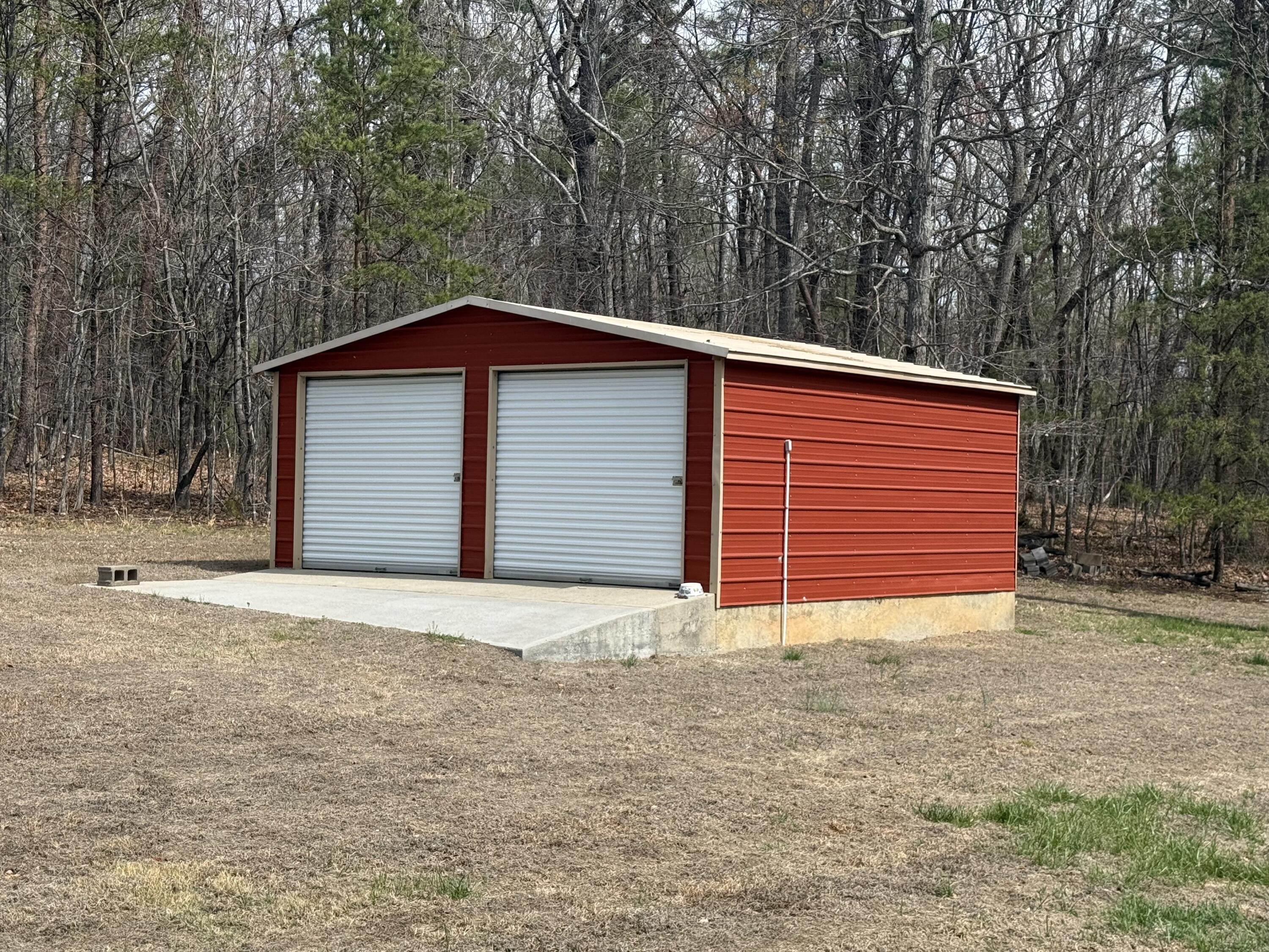 755 Goldmine Road Glade Hill, VA 24092 - Photo 11 of 13 a front view of a house with a yard and garage