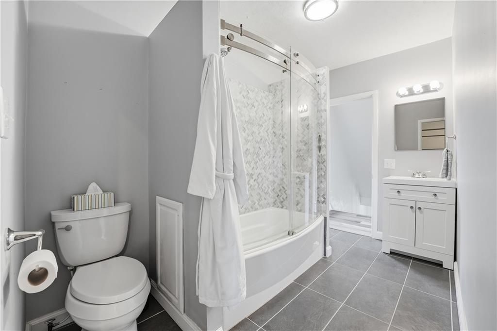 519 West Ridge Avenue Sharpsville, PA 16150 - Photo 22 of 48 a bathroom with a sink toilet and shower