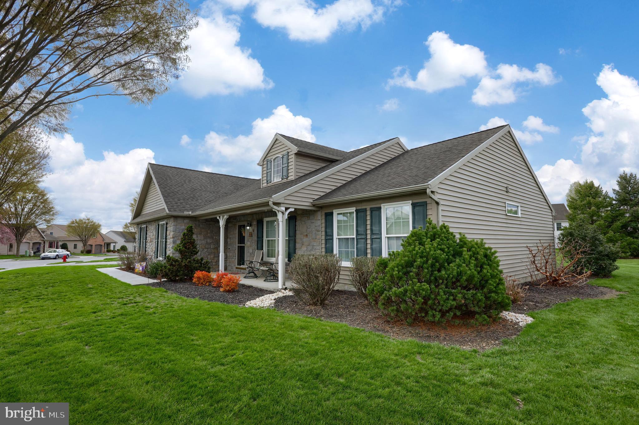 737 Heather Ridge Manheim, PA 17545 - Photo 2 of 40 a front view of house with yard and outdoor seating