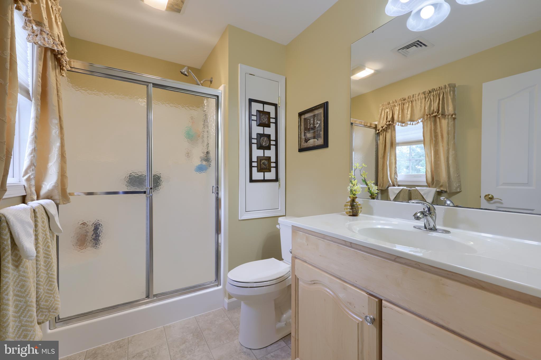 737 Heather Ridge Manheim, PA 17545 - Photo 26 of 40 a bathroom with a sink a toilet and shower