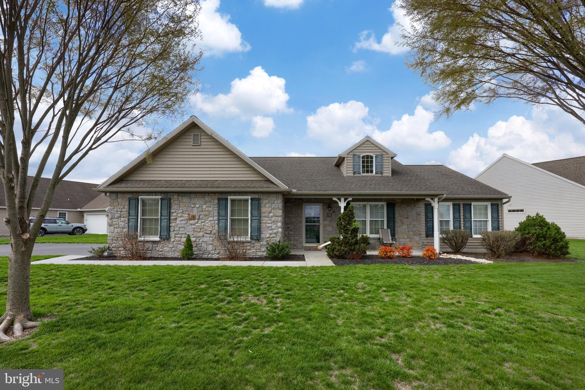 737 Heather Ridge Manheim, PA 17545 - Photo 3 of 40 a front view of a house with garden