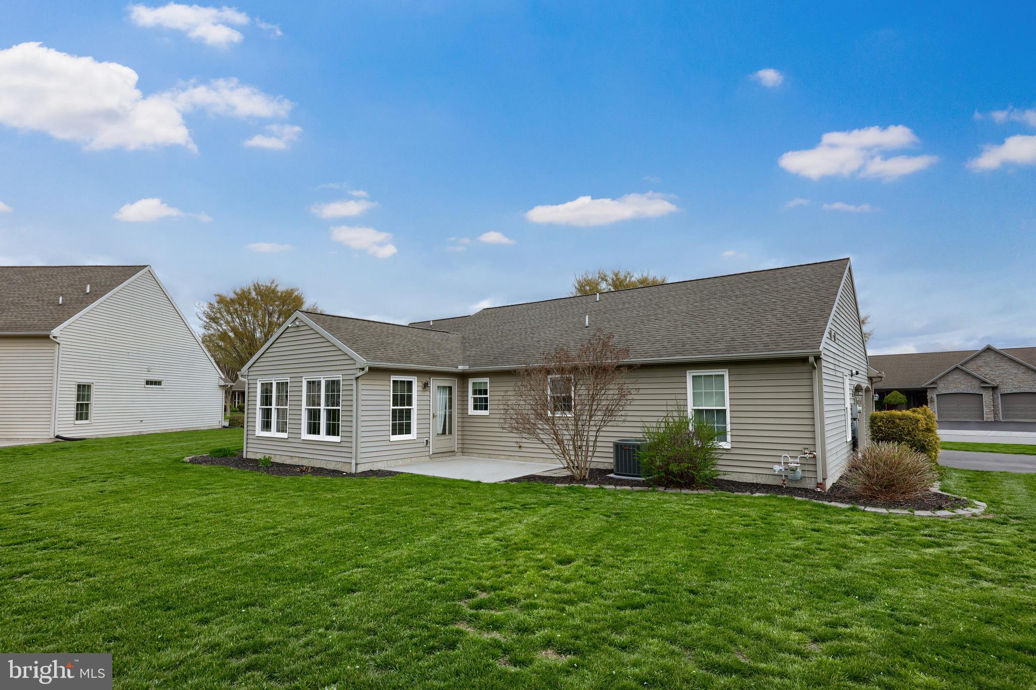 737 Heather Ridge Manheim, PA 17545 - Photo 32 of 40 a front view of a house with garden