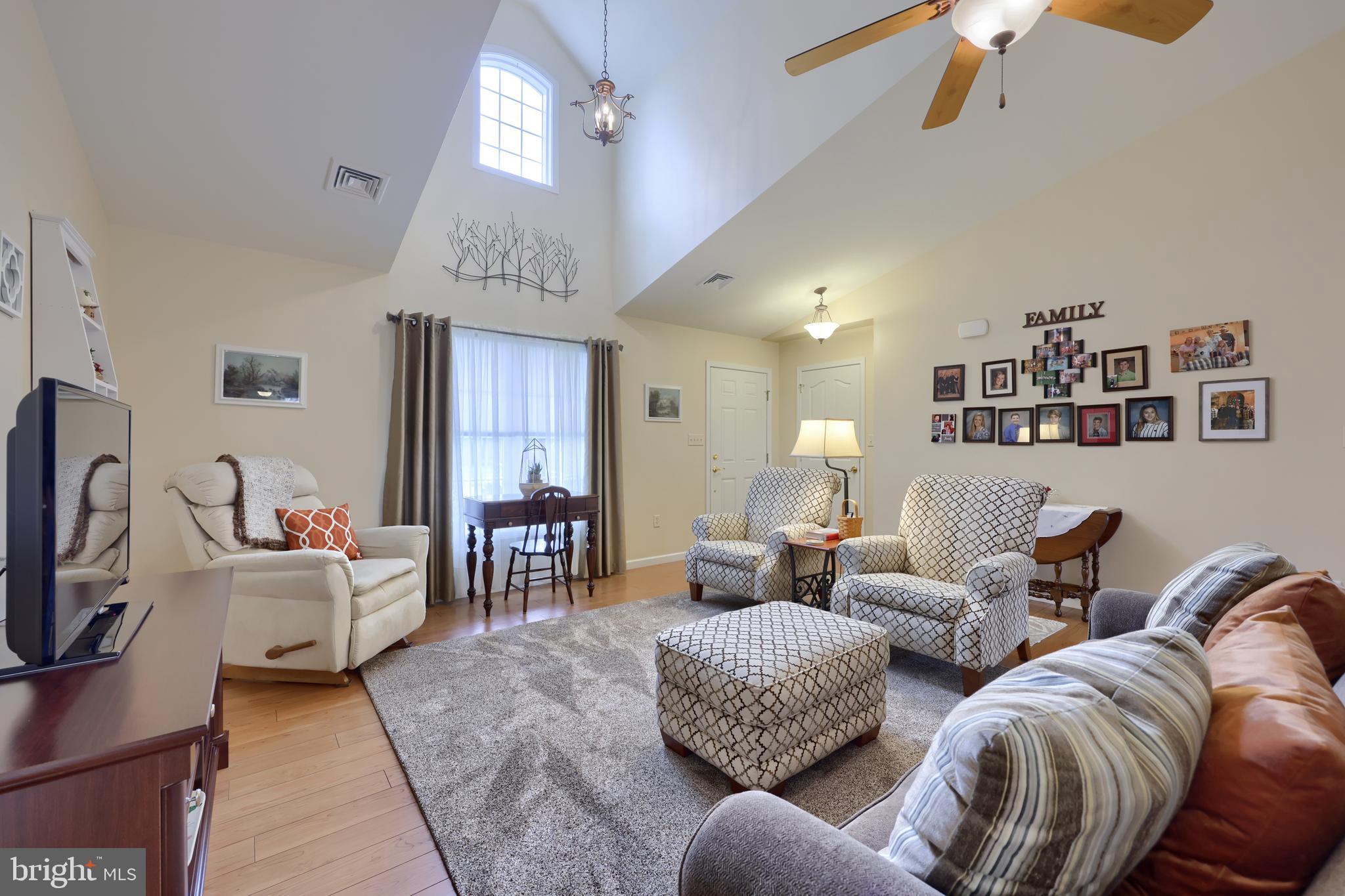 737 Heather Ridge Manheim, PA 17545 - Photo 7 of 40 a living room with furniture and a chandelier