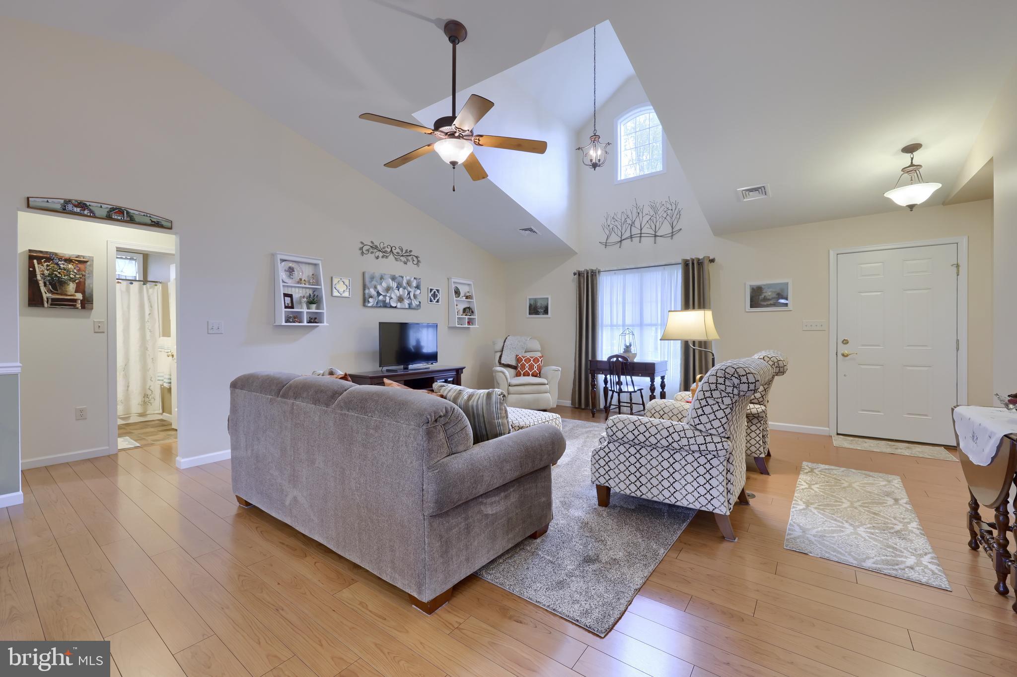 737 Heather Ridge Manheim, PA 17545 - Photo 9 of 40 a living room with furniture and a chandelier