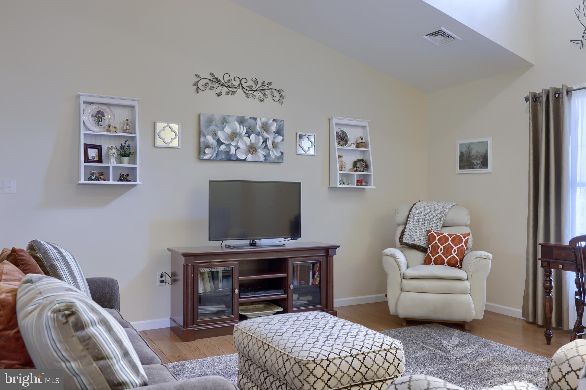 737 Heather Ridge Manheim, PA 17545 - Photo 10 of 40 a living room with furniture and a flat screen tv