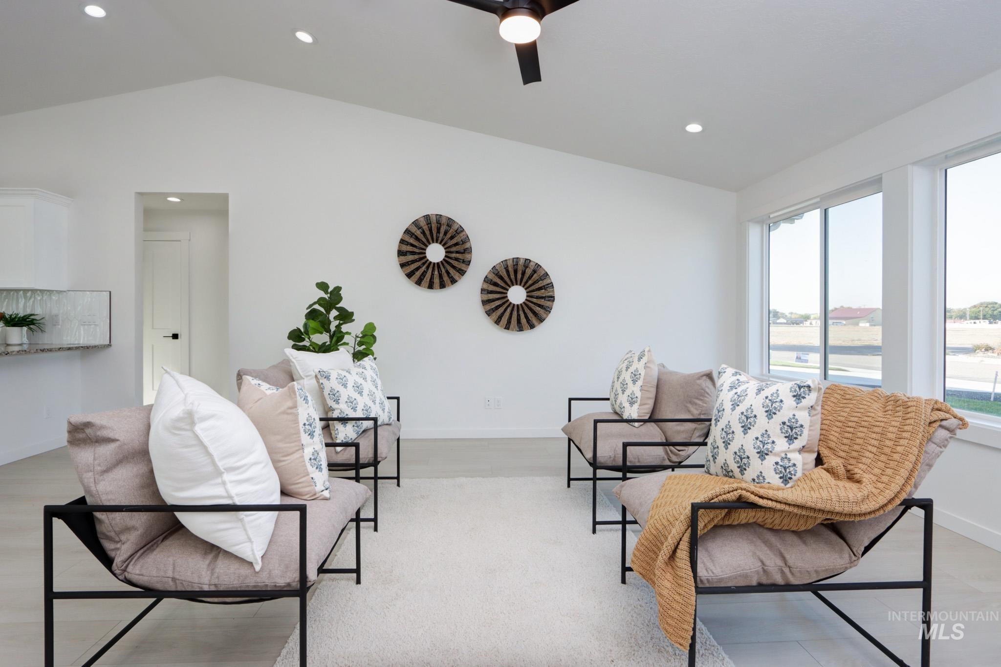 950 Campbell Street Vale, OR 97918 - Photo 13 of 37 Open-concept room featuring a vaulted ceiling with recessed lighting and a ceiling fan