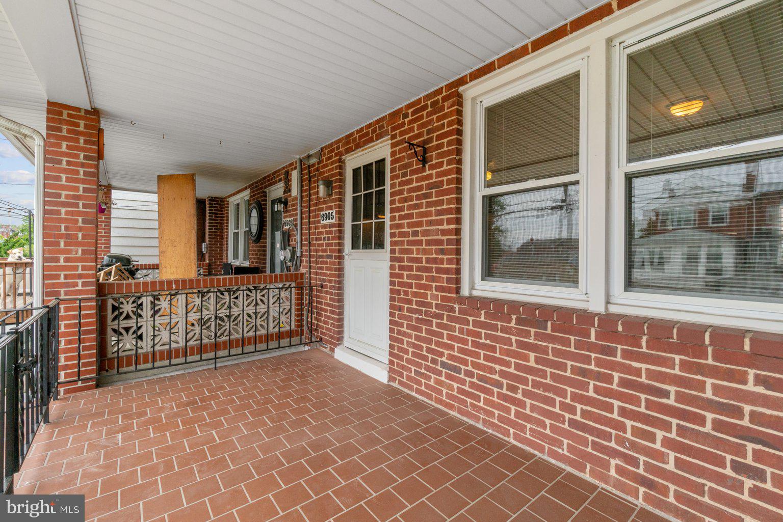 6905 Belclare Road Baltimore, MD 21222 - Photo 26 of 28 covered rear balcony/porch