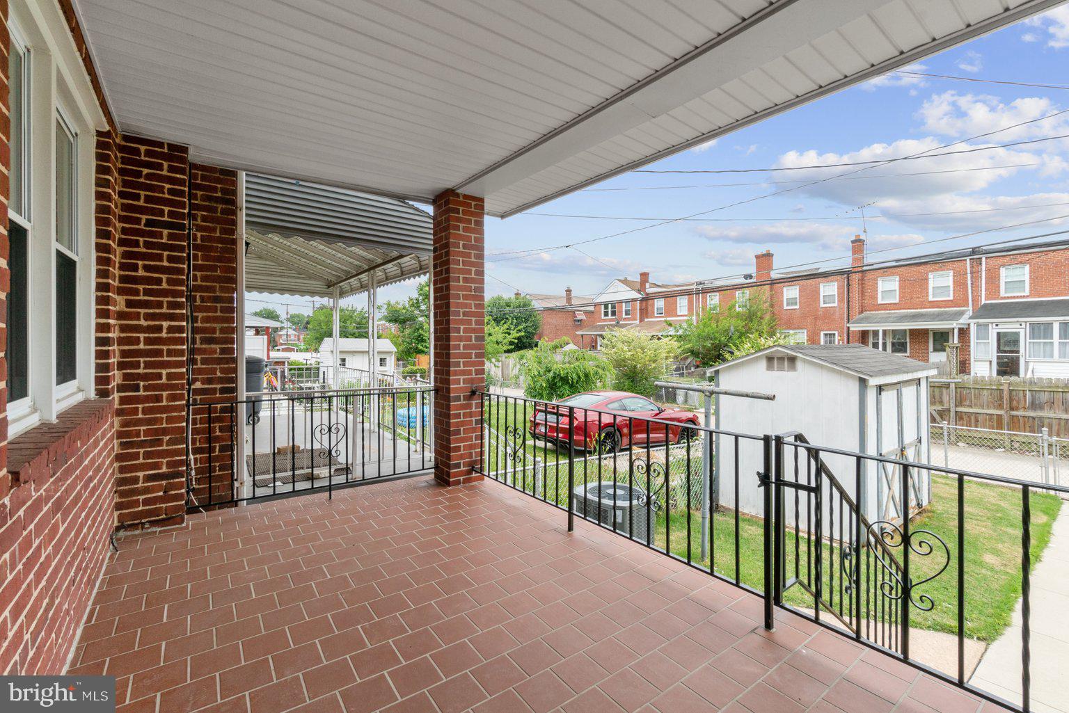 6905 Belclare Road Baltimore, MD 21222 - Photo 27 of 28 covered rear balcony/porch