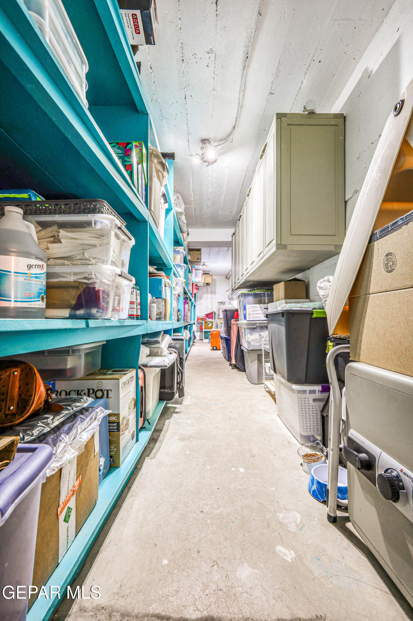 3408 Lebanon Avenue El Paso, TX 79930 - Photo 24 of 45 a storage room with washer and dryer