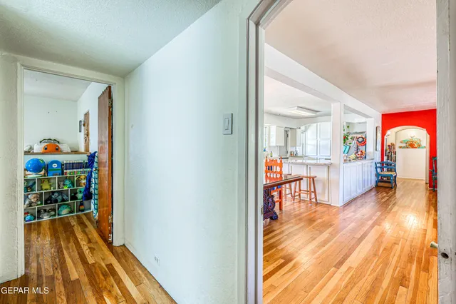 a bed room with a bed and a chair