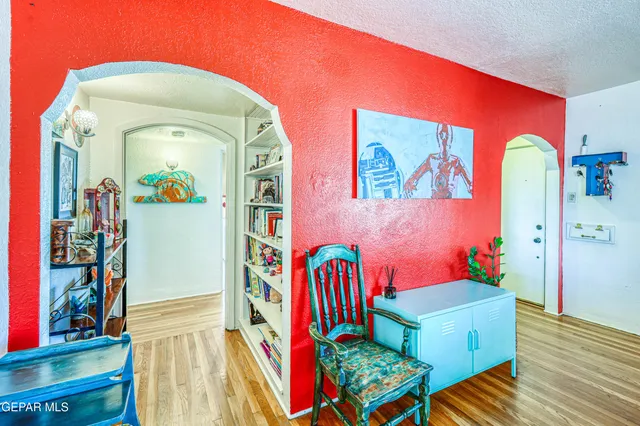 a view of a house with a yard patio and fire pit