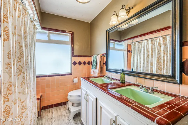 a view of a house with backyard outdoor seating area and furniture