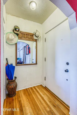 a kitchen with stainless steel appliances kitchen island granite countertop a sink stove and cabinets