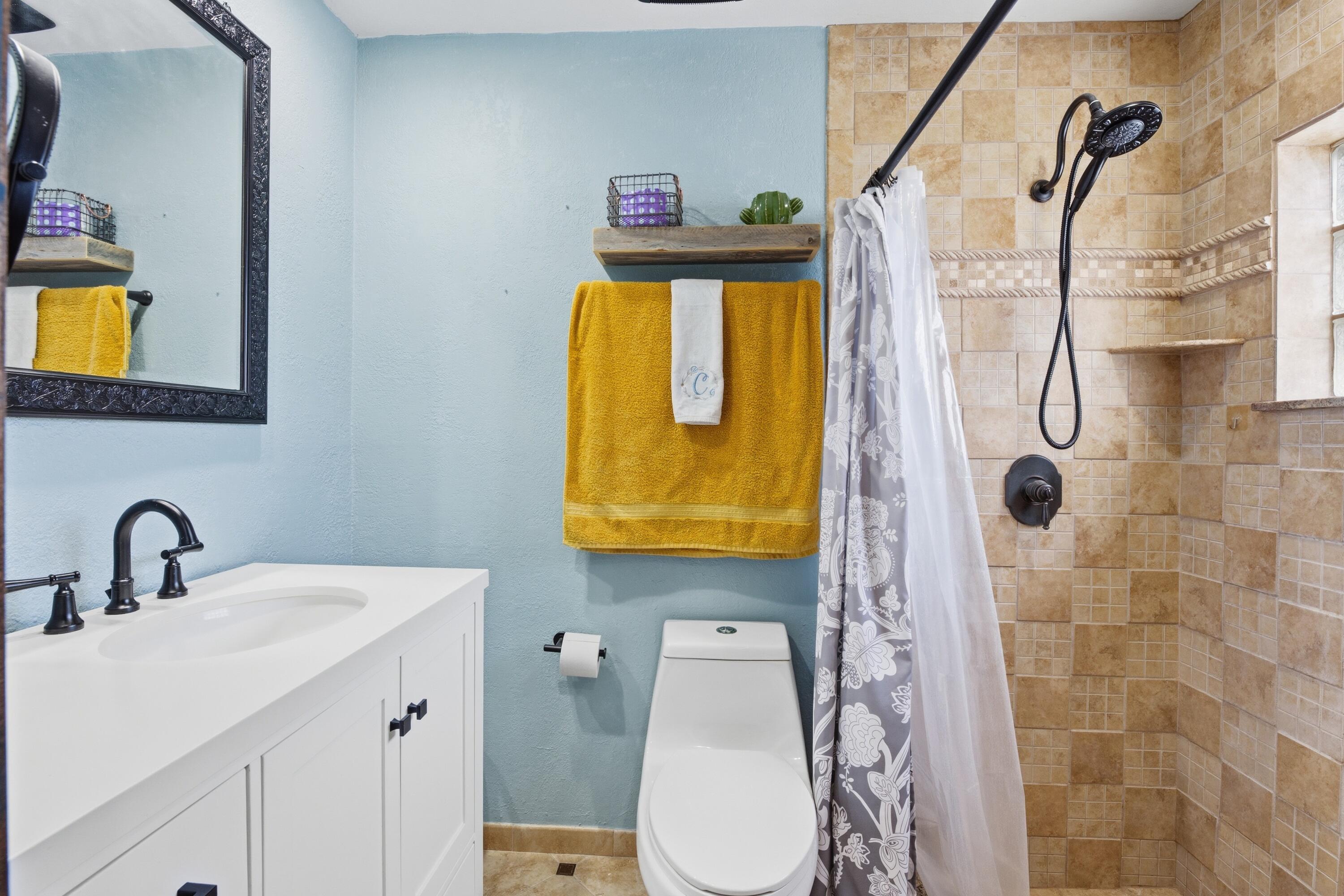 22504 Southwest 65th Avenue Boca Raton, FL 33428 - Photo 21 of 36 a bathroom with a sink mirror and toilet