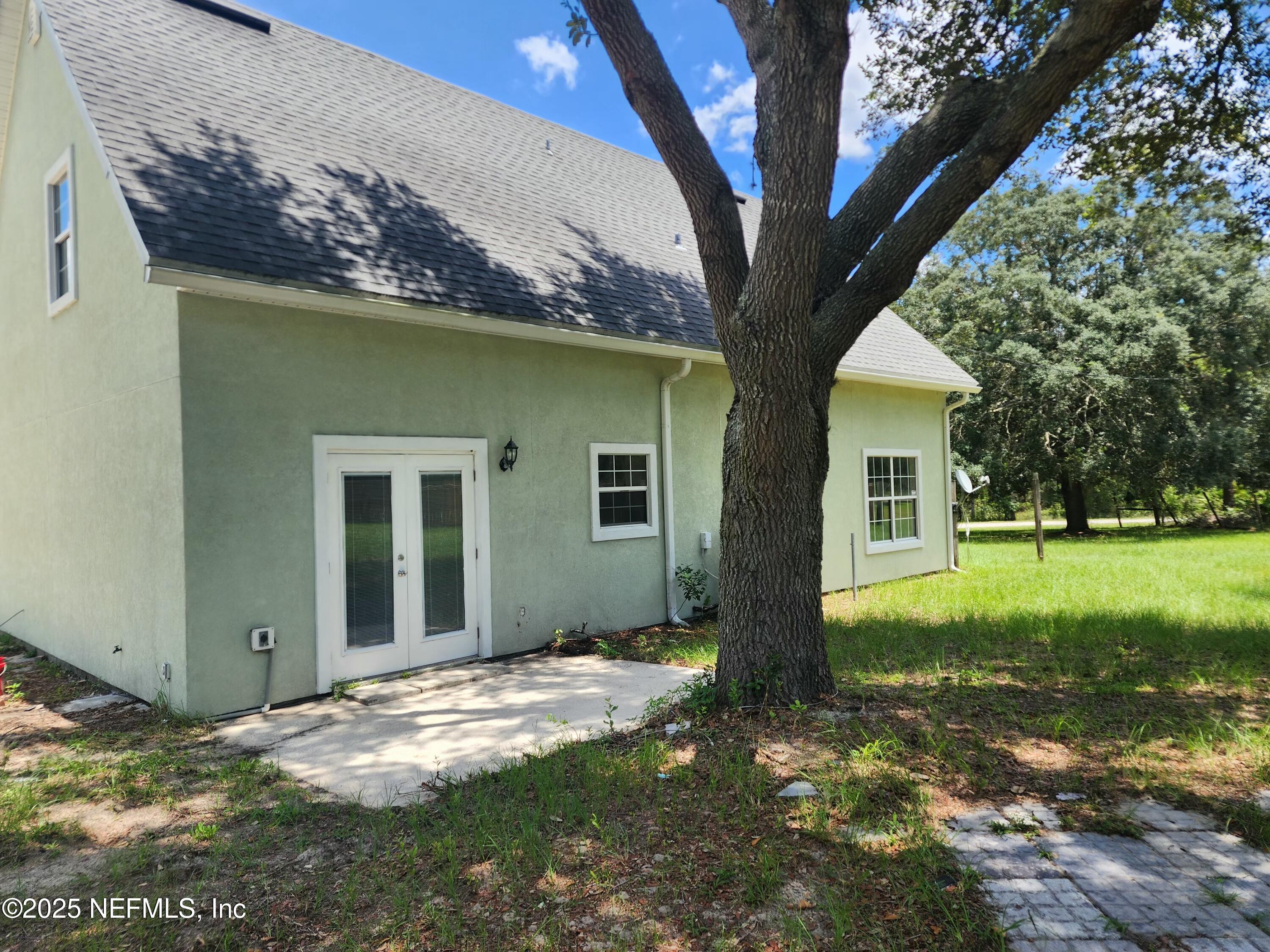 3794 Ron Road Green Cove Springs, FL 32043 - Photo 29 of 34 a view of a house with a yard