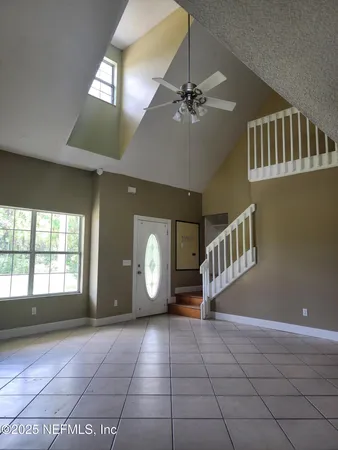 a view of an entryway with a livingroom