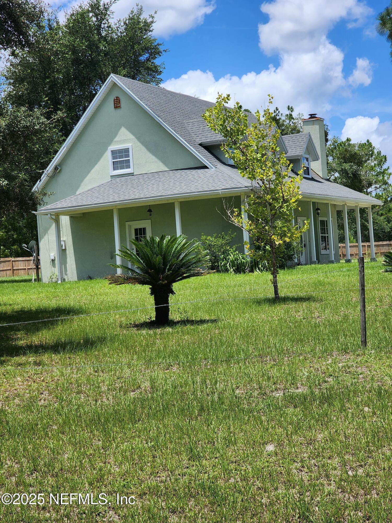 3794 Ron Road Green Cove Springs, FL 32043 - Photo 33 of 34 a front view of a house with a yard