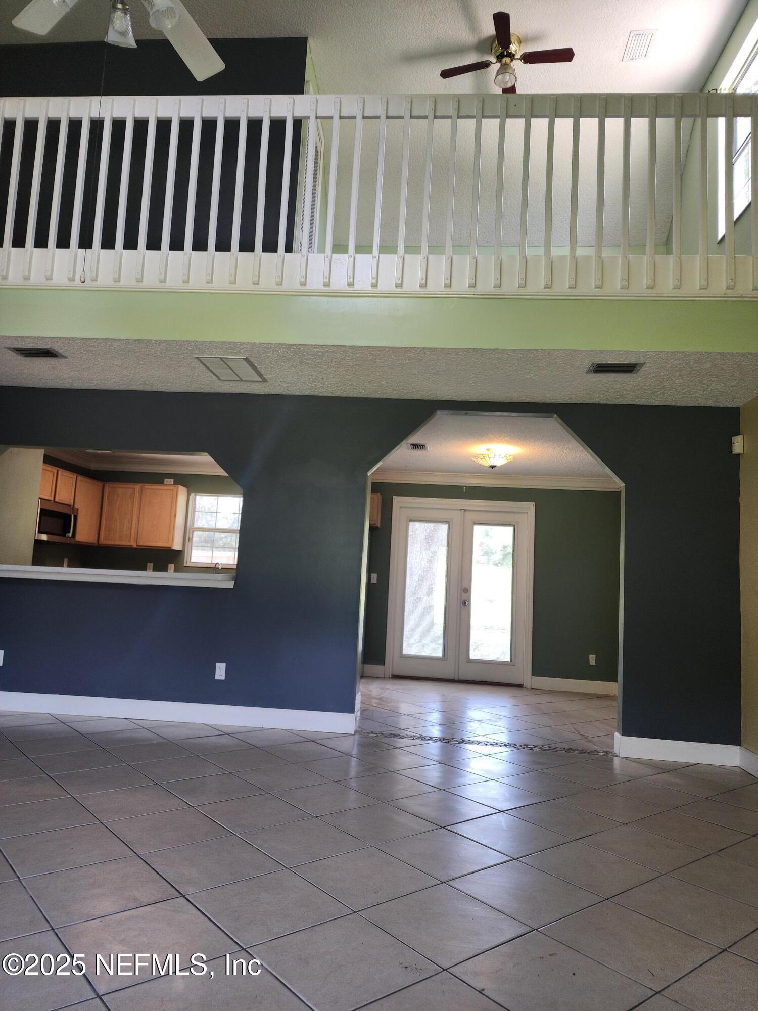 3794 Ron Road Green Cove Springs, FL 32043 - Photo 6 of 34 a view of gallery with wooden floor