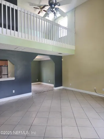 a view of an entryway with a chandelier