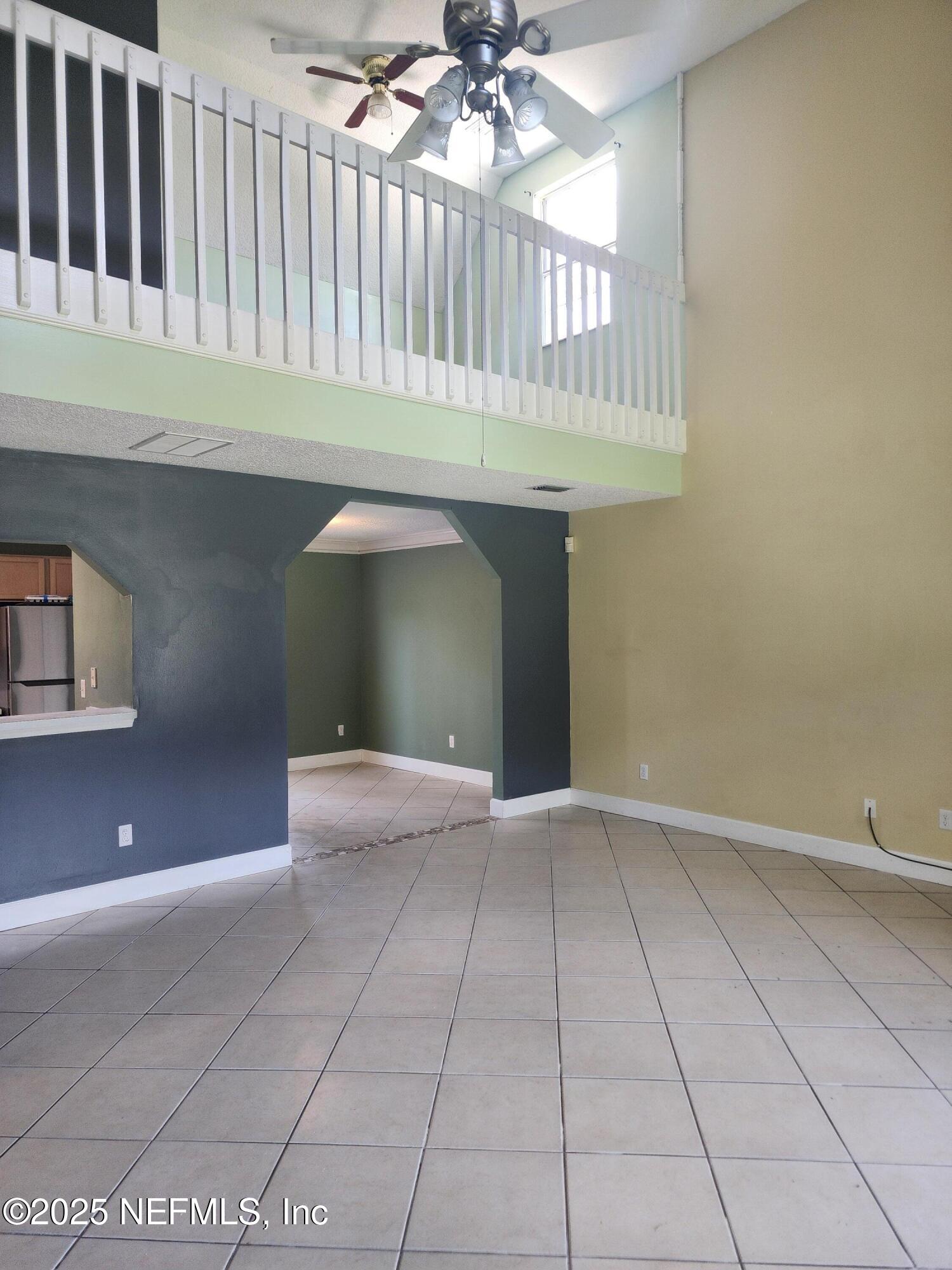 3794 Ron Road Green Cove Springs, FL 32043 - Photo 7 of 34 a view of an entryway with a chandelier