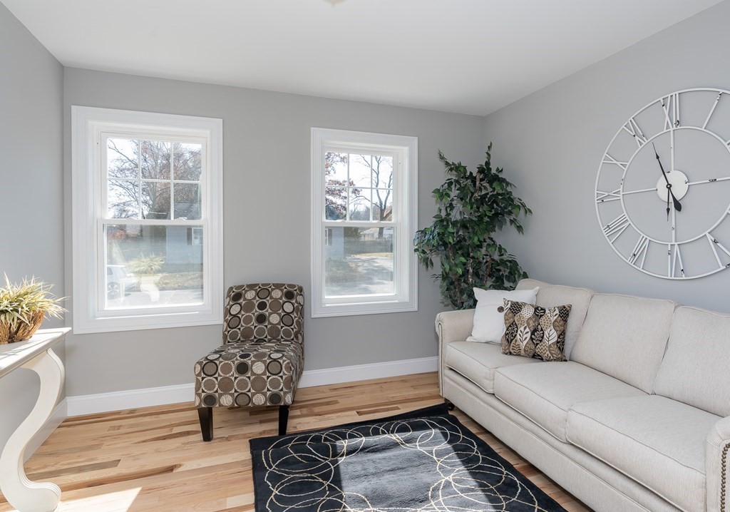 16 Cornflower Street Springfield, MA 01118 - Photo 16 of 36 a living room with furniture and window
