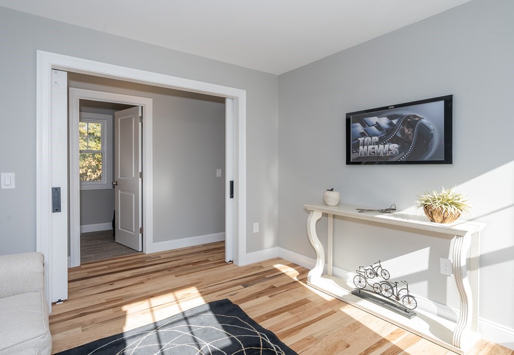 16 Cornflower Street Springfield, MA 01118 - Photo 18 of 36 a view of a very nice looking room with many windows