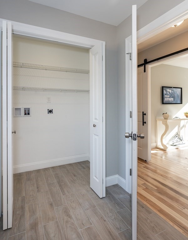 16 Cornflower Street Springfield, MA 01118 - Photo 20 of 36 a view of a room with wooden floor