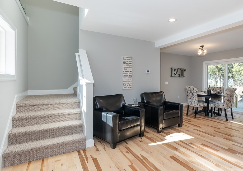 16 Cornflower Street Springfield, MA 01118 - Photo 21 of 36 a living room with furniture and wooden floor