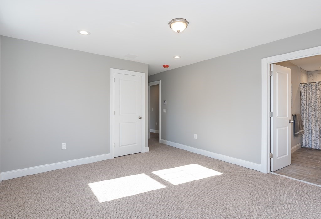 16 Cornflower Street Springfield, MA 01118 - Photo 23 of 36 an empty room with windows